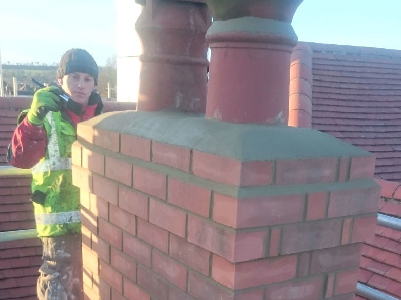 Re-setting chimney pots in concrete