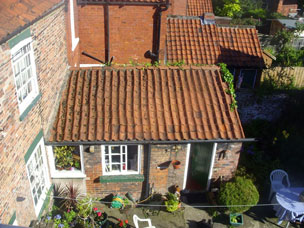 Roof tiles in need of refurbishment